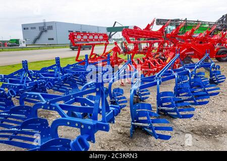 Kyiv, Ukraine - June 16, 2020: Tractor and Unia cultivator on the land for minimum-tillage technology at Kyiv, Ukraine on June 16, 2020. Stock Photo