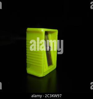 close up of old sharpener,over back ground as marble slate,black. Stock Photo