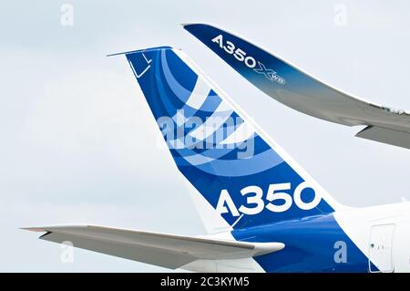 SINGAPORE - FEBRUARY 11: Tailplane and winglet of Airbus A350 XWB prototype 003 at Singapore Airshow, Changi Exhibition Centre in Singapore on Februar Stock Photo