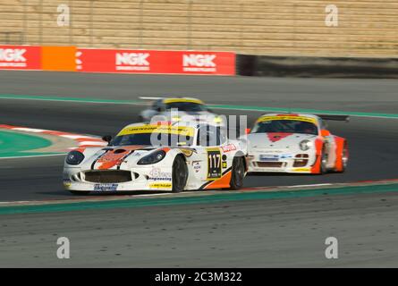 DUBAI - JANUARY 13: Car 117, a Ginetta G50, participating in the 2012 Dunlop 24 Hour Race at Dubai Autodrome on January 13, 2012. Stock Photo