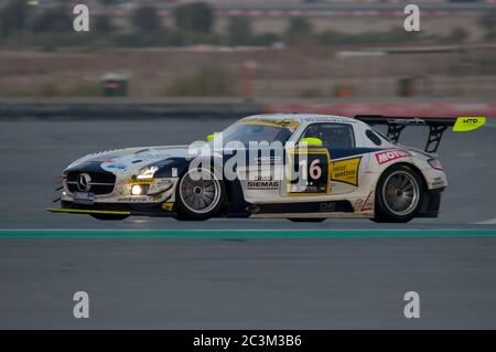 DUBAI - JANUARY 14: Car 16, a Mercedes SLS AMG GT3, during the morning hours of the 2012 Dunlop 24 Hour Race at Dubai Autodrome on January 14, 2012. Stock Photo