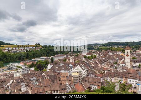 Aerial panorama view of old town cityscape of Schaffhausen and the Rhine river from the Munot fortification in summer on a cloudy day with beautiful c Stock Photo