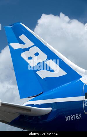 SINGAPORE - FEBRUARY 12: Tail fin of Boeing 787 Dreamliner at Singapore Airshow in Singapore on February 12, 2012. Stock Photo