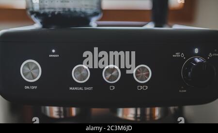 Black Edition Home Espresso Machine with illuminated buttons Stock Photo