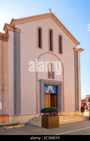 San Teodoro, Sardinia / Italy - 2019/07/15: San Teodoro church - Chiesa di San Teodoro - at Piazza Mediterraneo square of resort town at Costa Smerald Stock Photo