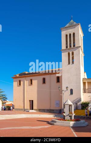 San Teodoro, Sardinia / Italy - 2019/07/15: San Teodoro church - Chiesa di San Teodoro - at Piazza Mediterraneo square of resort town at Costa Smerald Stock Photo