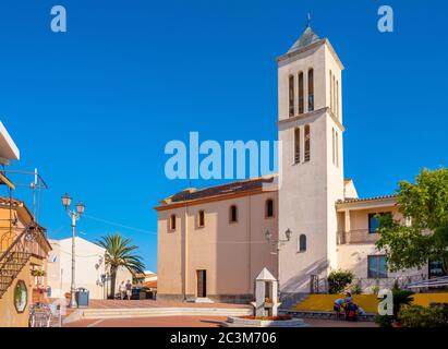 San Teodoro, Sardinia / Italy - 2019/07/15: San Teodoro church - Chiesa di San Teodoro - at Piazza Mediterraneo square of resort town at Costa Smerald Stock Photo