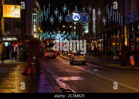 LONDON - NOVEMBER 17, 2016: Strand street with Christmas decorations and car light trails Stock Photo