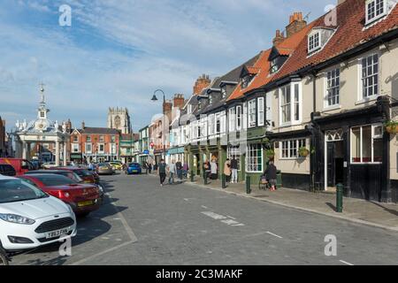 panoramic view of shops and a pub around Saturday Market in the centre of Beverley, East Yorkshire Stock Photo