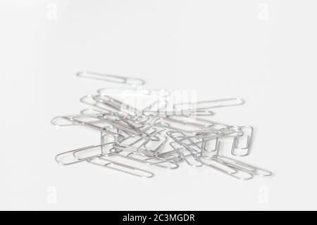 Paperclips gem paper clip clips stationery on table Stock Photo