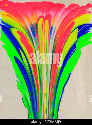 Psychedelic looking eruption of Green, Blue, Red, Yellow  acrylic paint  on an artists canvas Stock Photo