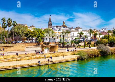 View fo the city east of the Guadalquivirfrom River from Puente de Isabel II (Triana Bridge), Seville, Spain Stock Photo