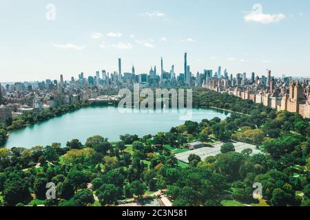 Circa September 2019: Spectacular View over Central Park in Manhattan with beautiful Rich Green Trees and Skyline of New York City Stock Photo