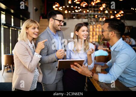 Business colleagues having conversation during coffee break Stock Photo