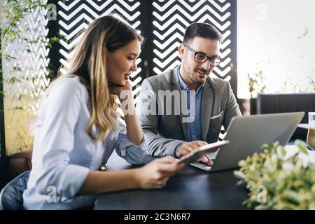 Programmers working in a software developing company office Stock Photo