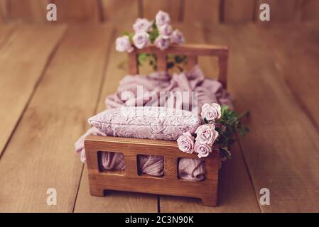 Newborn Digital Background Spring rose Basket Prop for Newborn. For boys and girls. Wood back. shoot set up with prop bed and wood backdrop Stock Photo