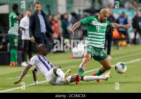 Lyes Houri of MOL Fehervar FC challenges David Siger of