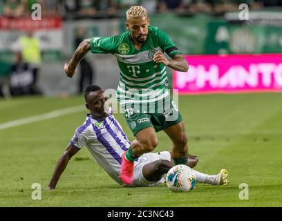 BUDAPEST, HUNGARY - JUNE 20: (r-l) Isael da Silva Barbosa of Ferencvarosi TC  challenges Dzenan Burekovic of Ujpest FC during the Hungarian OTP Bank Liga  match between Ferencvarosi TC and Ujpest FC