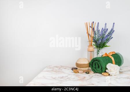 Spa objects and elements on a marble table and white background Stock Photo