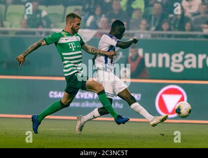 BUDAPEST, HUNGARY - JUNE 20: (l-r) Obinna Nwobodo of Ujpest FC