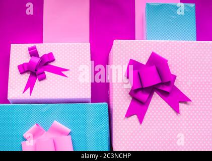 Merry Christmas, new year holiday present  boxes, gifts pile with bright wrapping, silk ribbon bows . Stock Photo