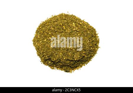 Original Israel and Arabic Za'atar spice isolated on white background. Pile of Middle eastern traditional spice mixture zaatar. Top view Stock Photo