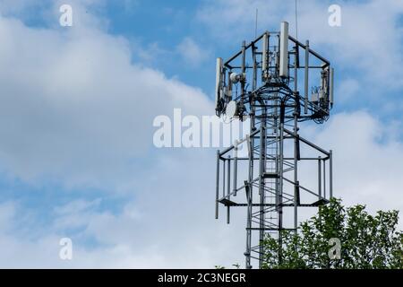 A mobile communications tower on a summer's day in 2020 in Kilsyth, Scotland Stock Photo