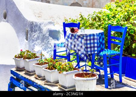 Traditional Greece. Typical street restaurants (taverns) of Greece. Naxos, Cycades. Stock Photo
