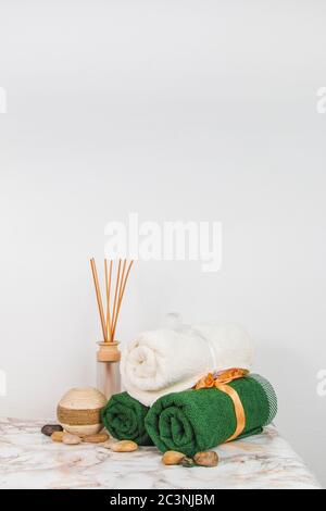 Spa objects and elements on a marble table and white background Stock Photo