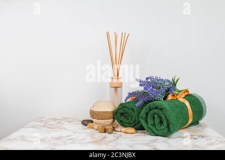 Spa objects and elements on a marble table and white background Stock Photo