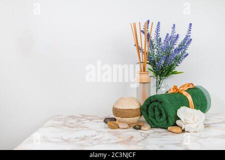 Spa objects and elements on a marble table and white background Stock Photo