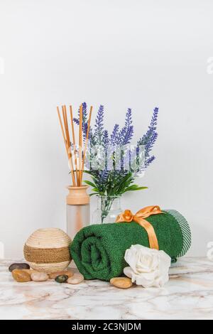 Spa objects and elements on a marble table and white background Stock Photo
