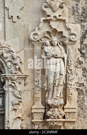 St. Anne holding the infant Mary, carvings at church facade at Mission San Jose in San Antonio, Texas, USA Stock Photo