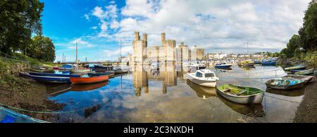 Caernarfon Castle in Wales in a beautiful summer day, United Kingdom Stock Photo