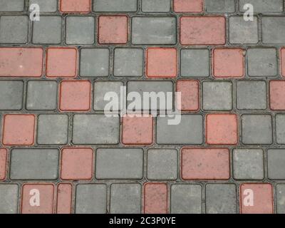 Texture of wet paving slabs with spots and reflections Stock Photo