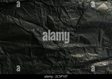 black crumpled paper. abstract background. black background Stock Photo