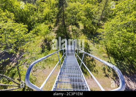 Close up view of top down view of metal stairs to slalom mountain on beautiful summer day. Sweden. Europe. Stock Photo