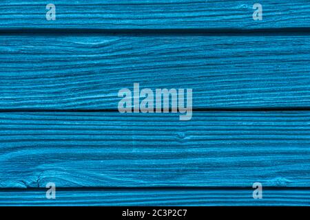 old boards painted with blue paint. blue background Stock Photo