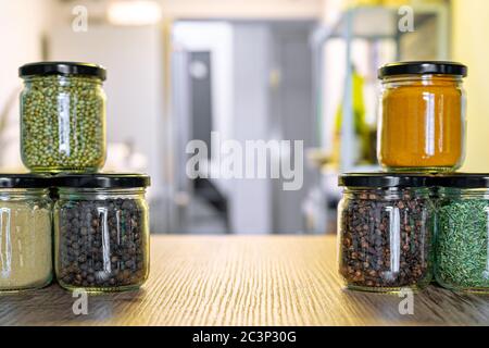 https://l450v.alamy.com/450v/2c3p30g/assorted-spices-and-herbs-in-glass-jars-for-cooking-indian-spices-multi-colored-2c3p30g.jpg