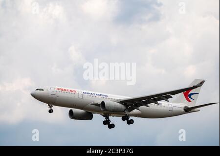 China Eastern Airlines Airbus A330-200 B-5961 approaching to land at EDDF Frankfurt Airport in Germany Stock Photo