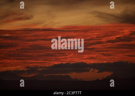 Fiery Red Sunset over Table Mountain Stock Photo