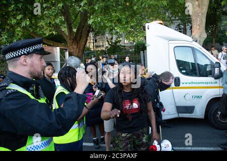 London UK 21 June 2020 People surround  the vehicle man used to drive  at  Black Lives Matter Protesters in Westminster.   One person was injured. He was arresteded near the scene after being stoped by police. Credit: Thabo Jaiyesimi/Alamy Live News