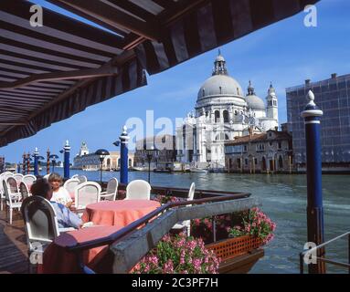 Santa Maria Della Salute from terrace restaurant, Grand Canal, Venice (Venezia), Veneto Region, Italy Stock Photo