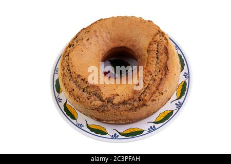 Delicious homemade walnut cake on a decorated serving plate Stock Photo