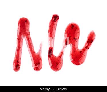 Cherry jam drizzle isolated on white background. Splashes of red berry jam. Top view. Stock Photo