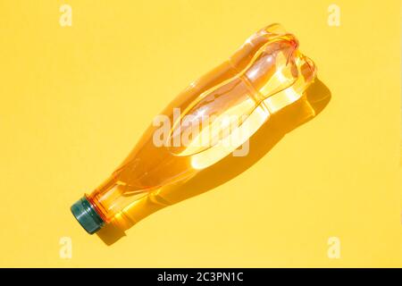 Mineral water bottle on yellow background Stock Photo