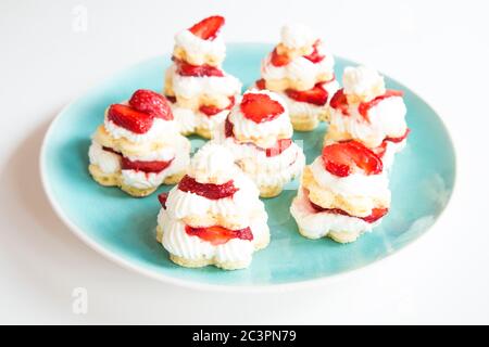 Strawberry cakes on blue plate Stock Photo