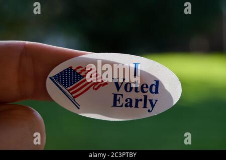 I voted early sticker on a woman's finger Stock Photo