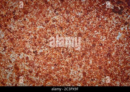 Image of a brown colored surface resulting from the oxidation of a metal due to environmental conditions. Conceptual texture Stock Photo