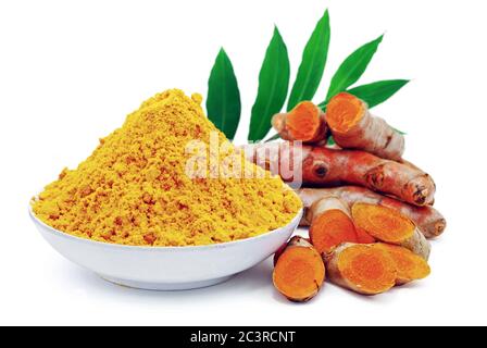 Turmeric root and powder isolated on white background Stock Photo